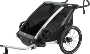 Thule Coaster XT cykelvagn i grått och svart, redo för äventyr med barnen.