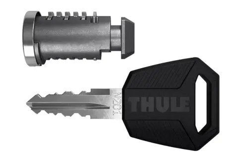 Ett Thule lås och en nyckel med Thule-logotyp. Säkerhet för dina äventyr.